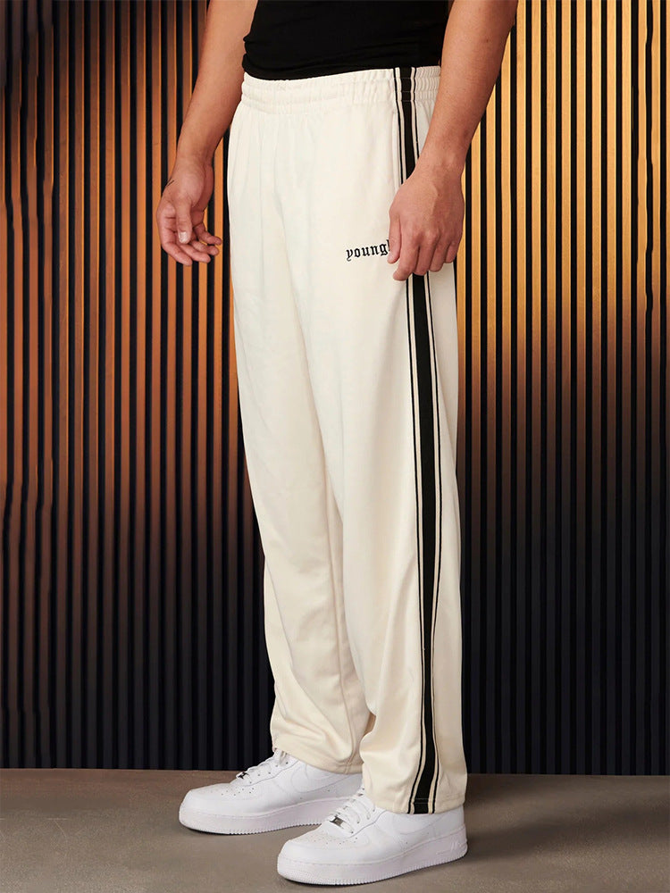 Pantalones casuales con costura de cinta en blanco y negro para hombre, bordados a rayas, para fitness y deportes