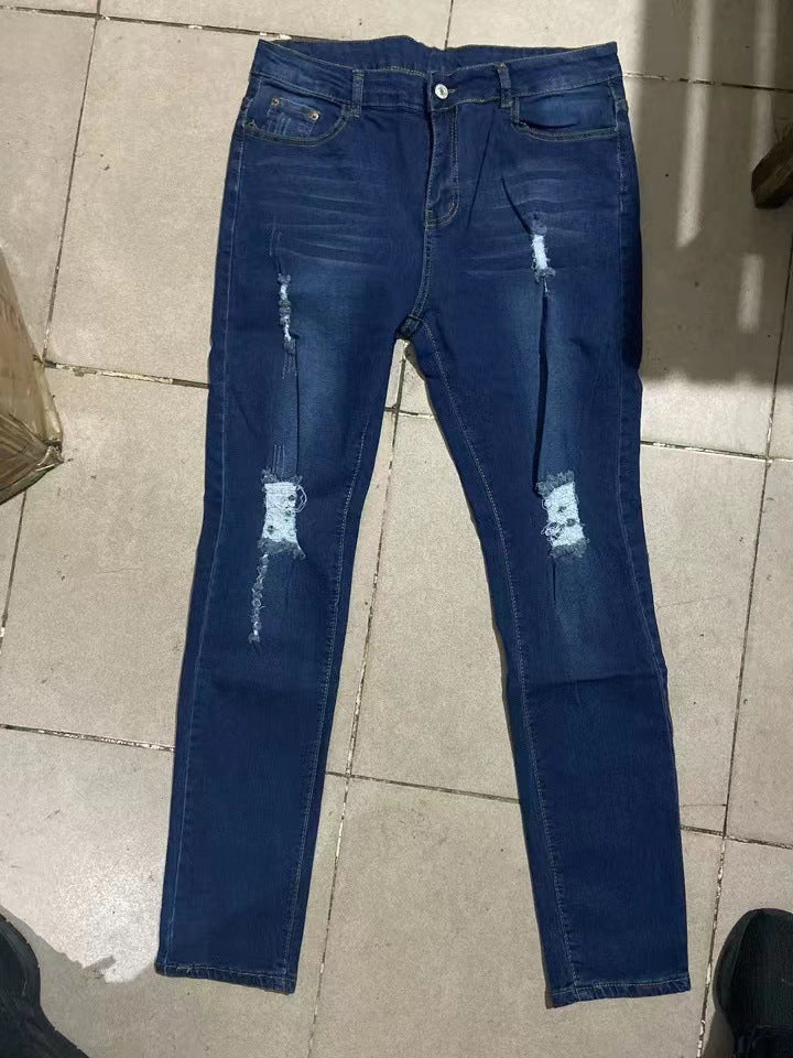 Pantalones de estudiante con agujeros de moda