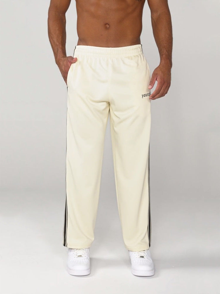 Pantalones casuales con costura de cinta en blanco y negro para hombre, bordados a rayas, para fitness y deportes